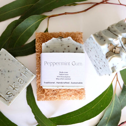 Peppermint eucalyptus tallow soap on an eco coconut soap rest