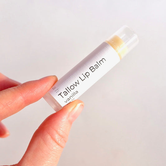 tallow lip balm being held